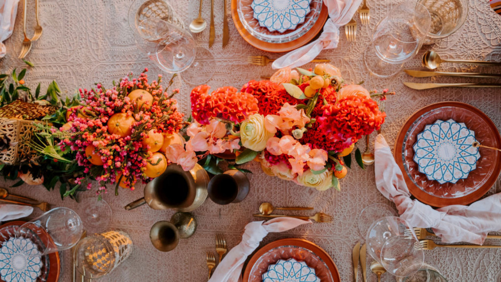 overhead view of a tablescape at an outdoor luxury glamping event